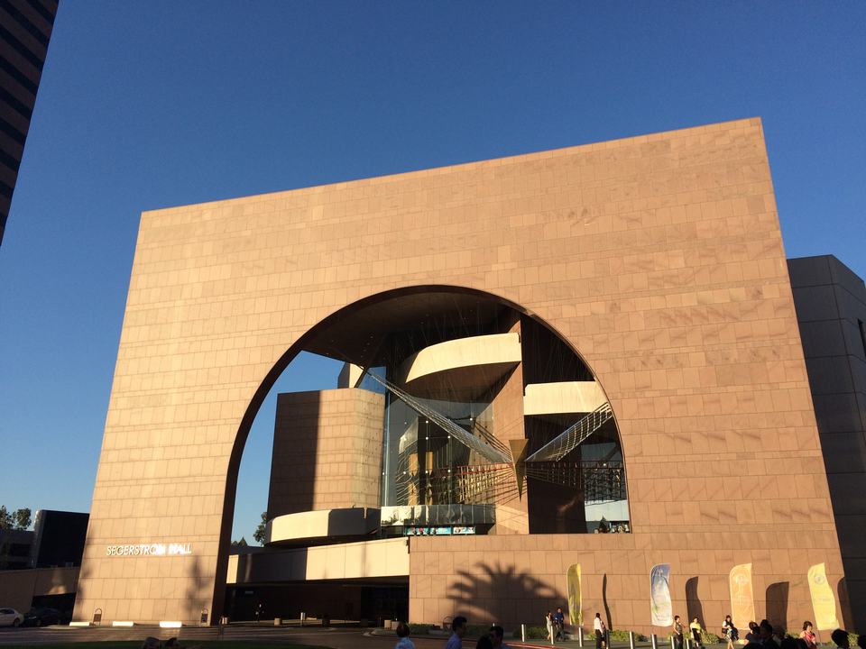 The curved glass facade of the Segerstrom Concert Hall in Costa Mesa